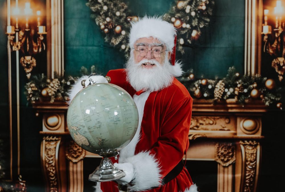 Santa Roger greeting guests